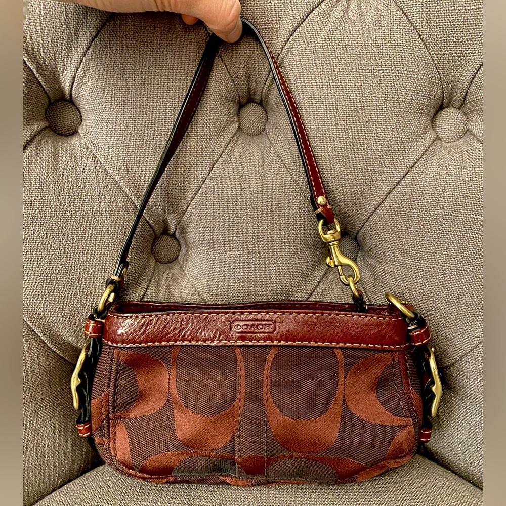 Coach Burgundy Canvas wristlet, very good condition!